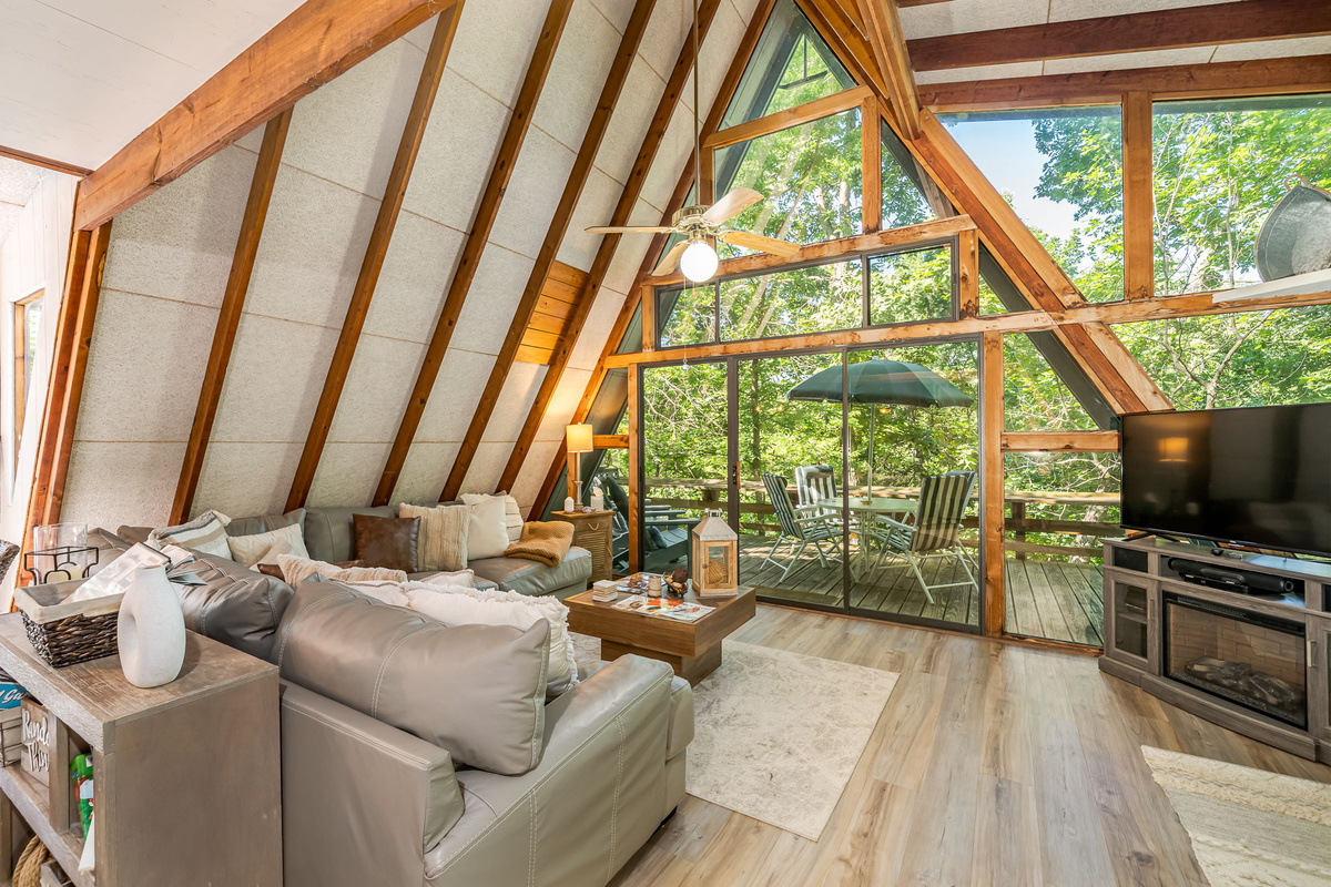 Find your spot on the sectional — the whole crew fits under that A-frame ceiling!