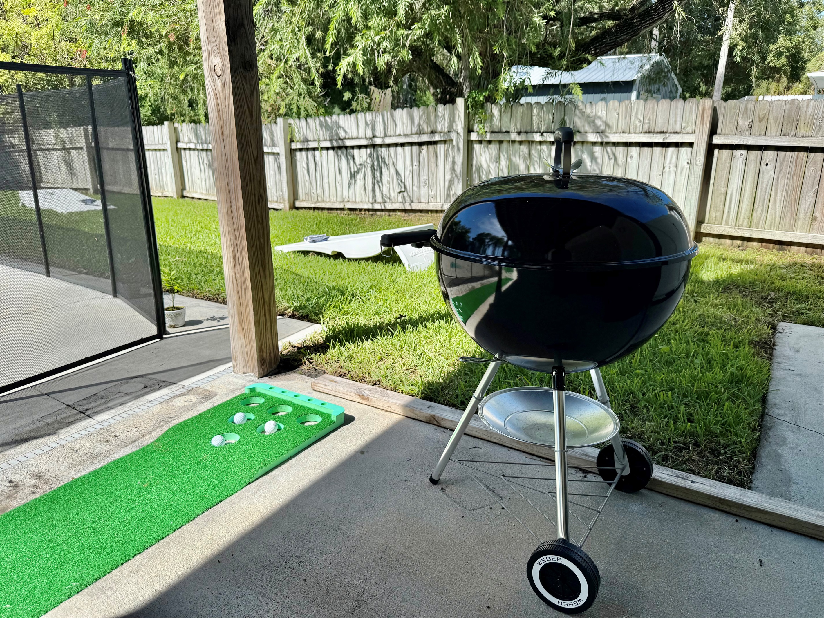 Whether you’re grilling, lounging, or playing games, there’s something for everyone in this backyard.