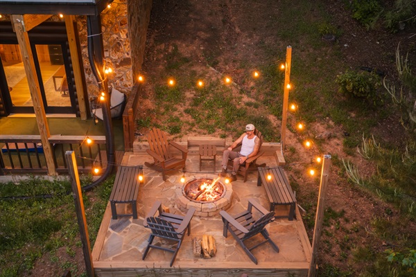 Firepit nights under the stars with string lights and mountain air. The private firepit is conveniently located off of the lower-level deck.