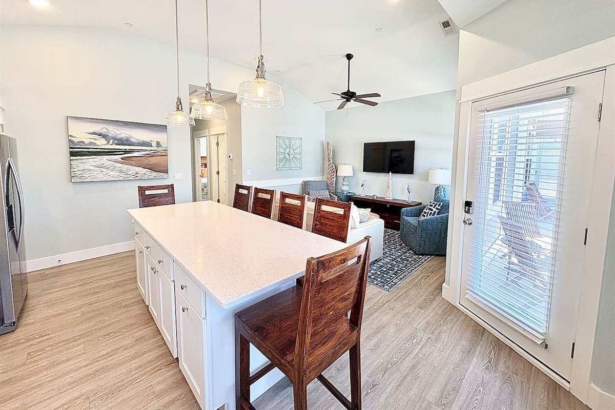 Open-concept kitchen, dining, and living space