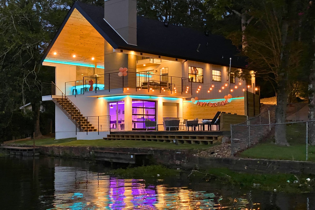 Colorful LED accents, glowing fire pits, and lake reflections set the perfect mood for evenings outdoors.