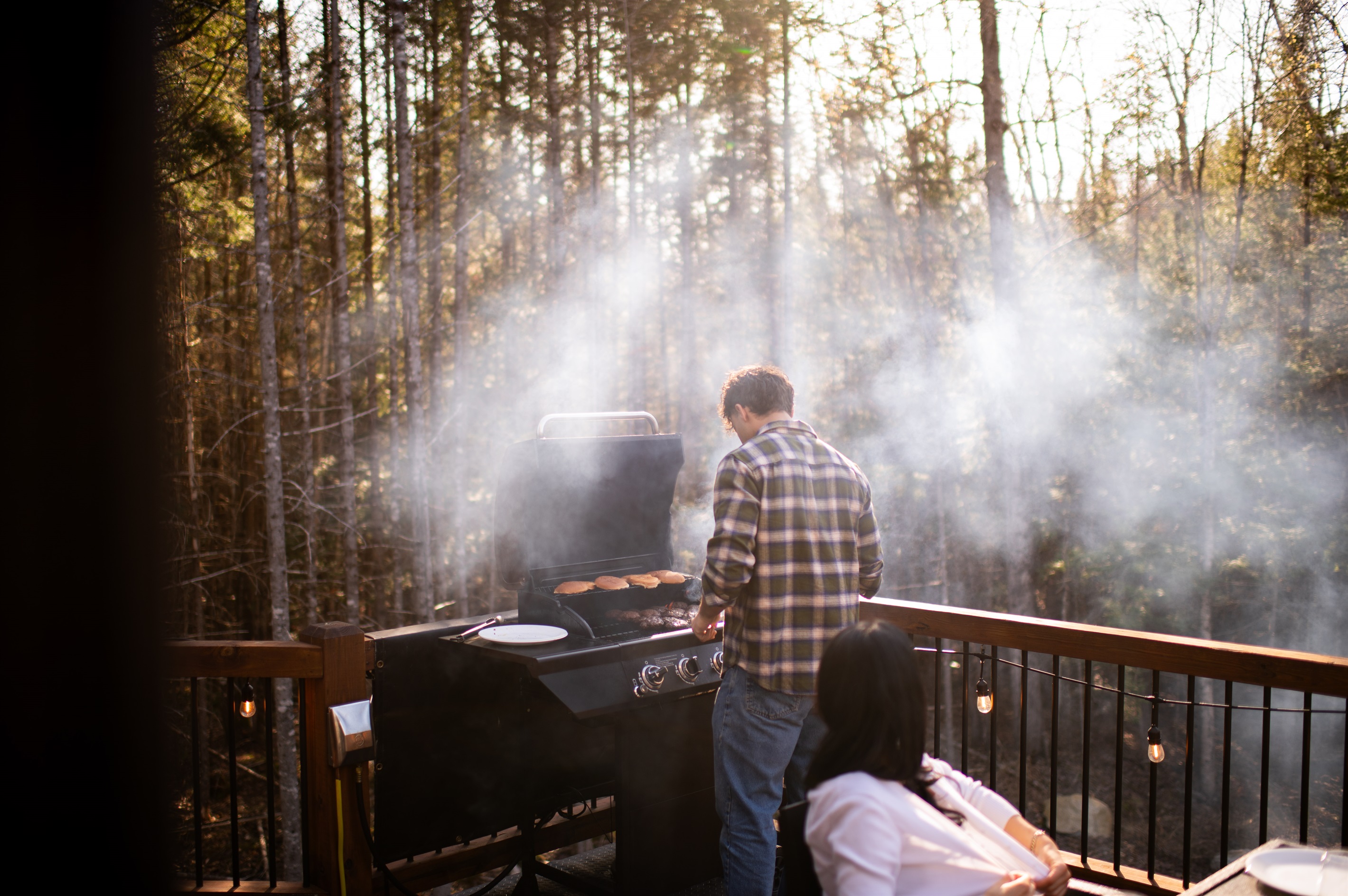 The 4-burner propane grill is ready for you. Because dinner tastes better in the mountains!
