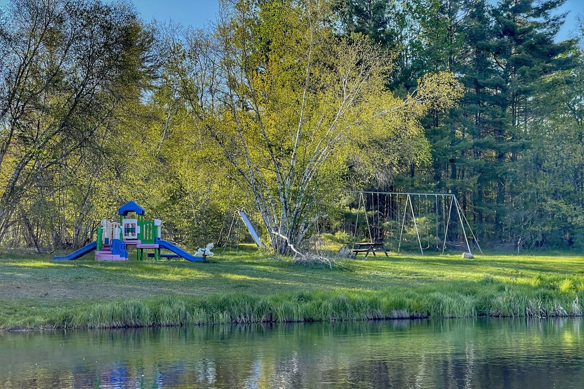 Kids will enjoy the playground at the Lake Eaton waterfront, a 5-minute drive from our home. 