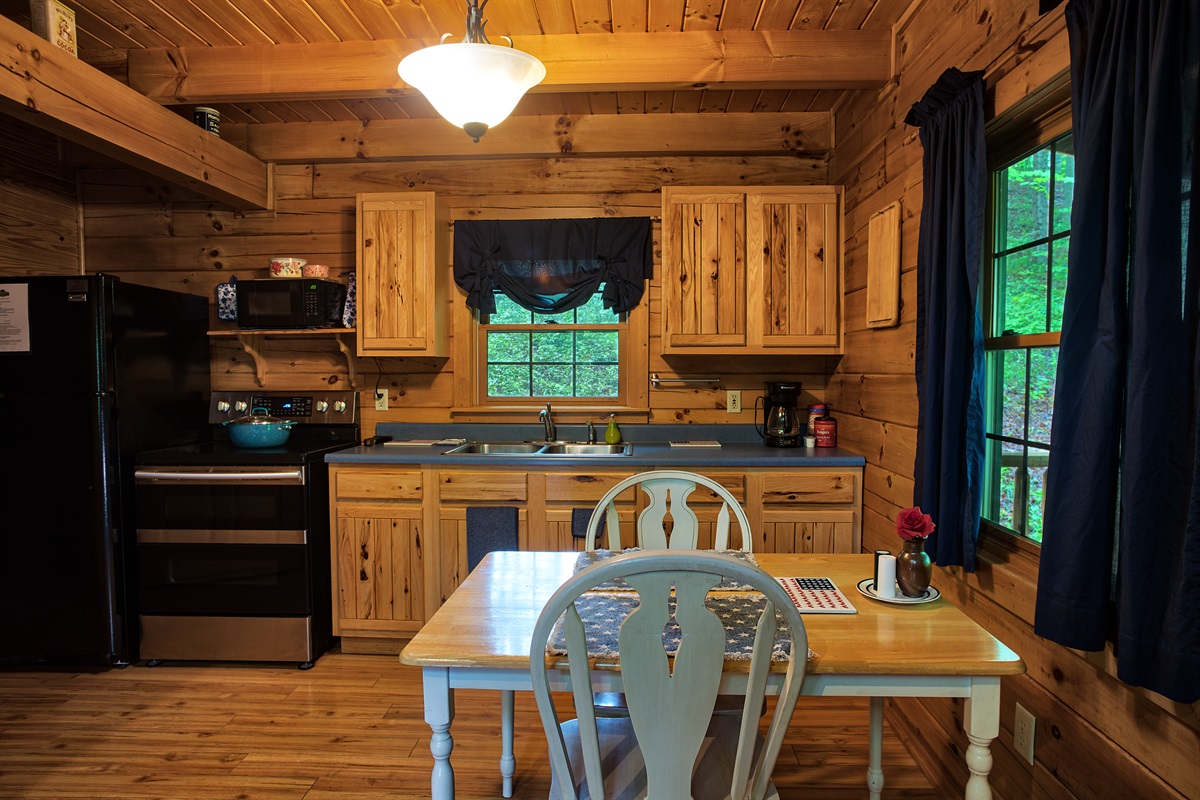 The open area concept includes a dining table for two.