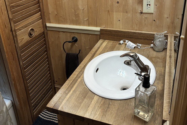 Main floor bathroom with wash basin