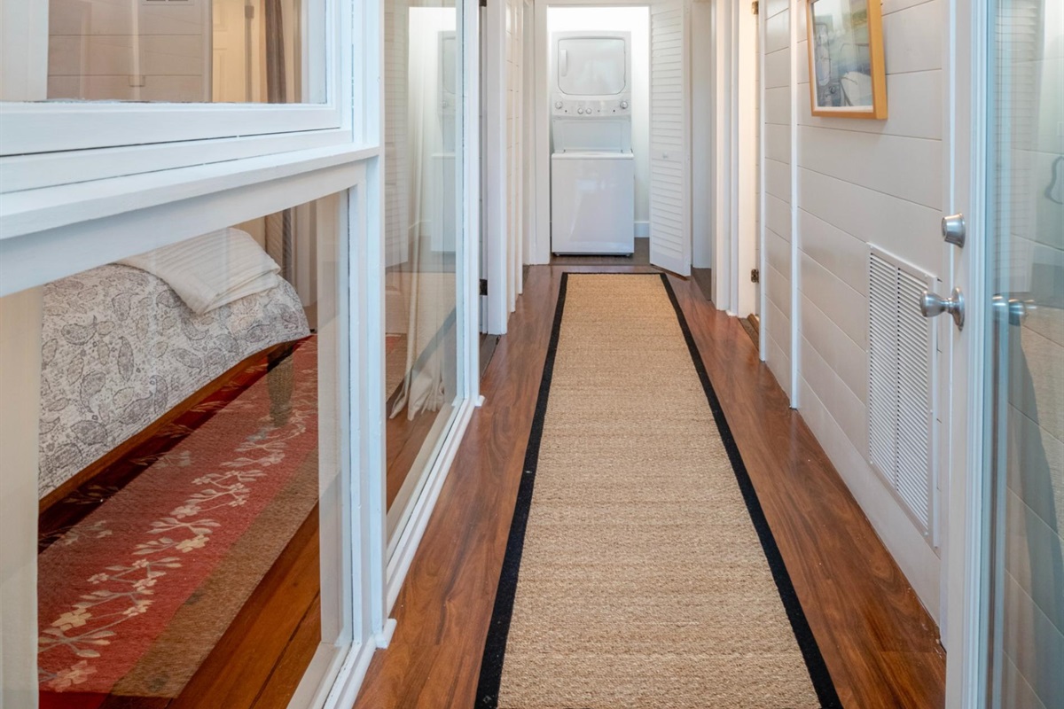 Hallway showcasing heart pine floors