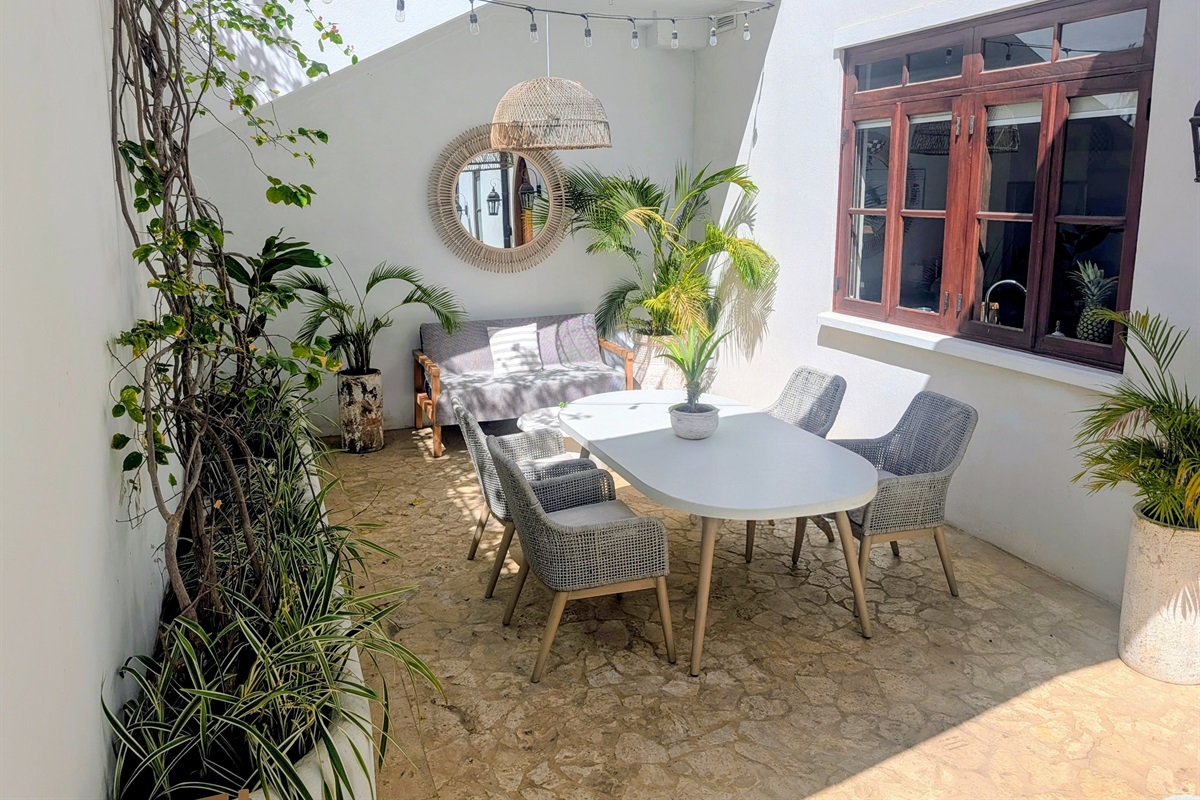 Outdoor dining with grill area