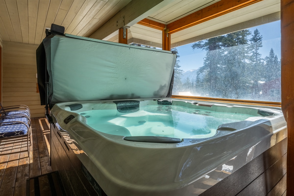 Hot tub enjoys wind and weather protection, for easy, cozy apres.