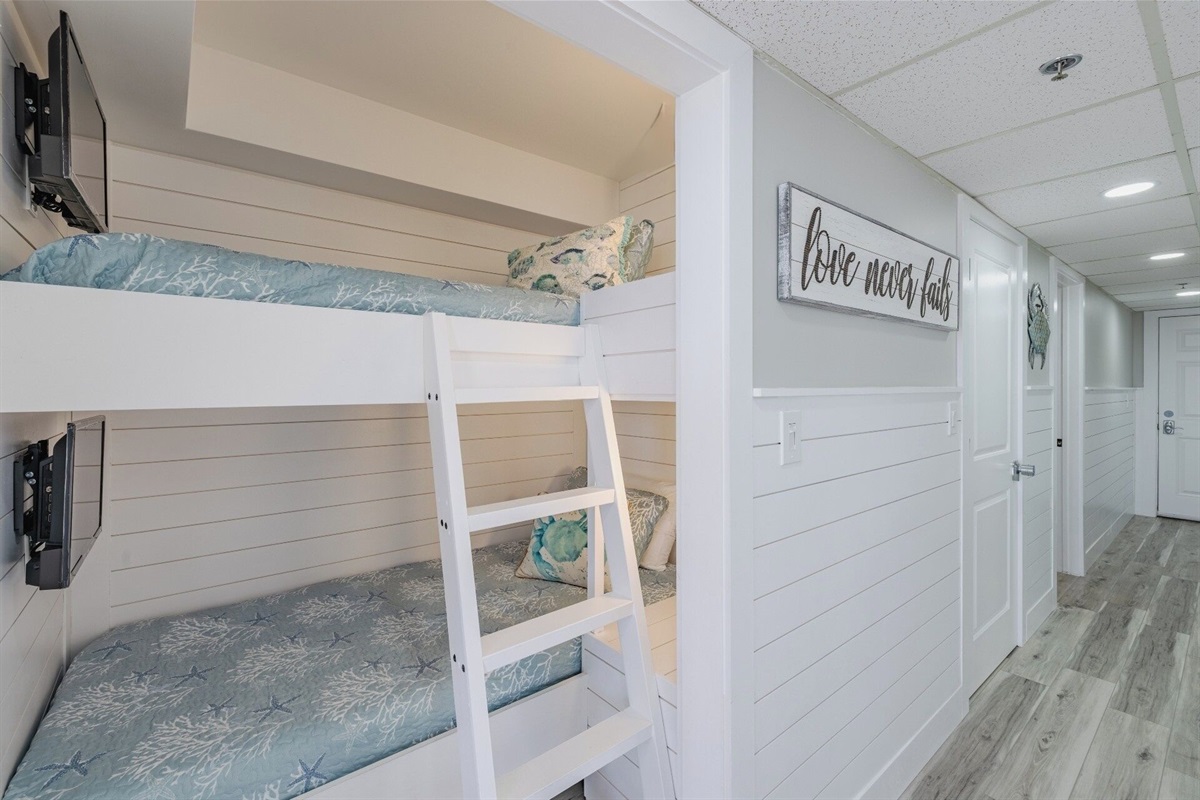 Bunk nook with TVs