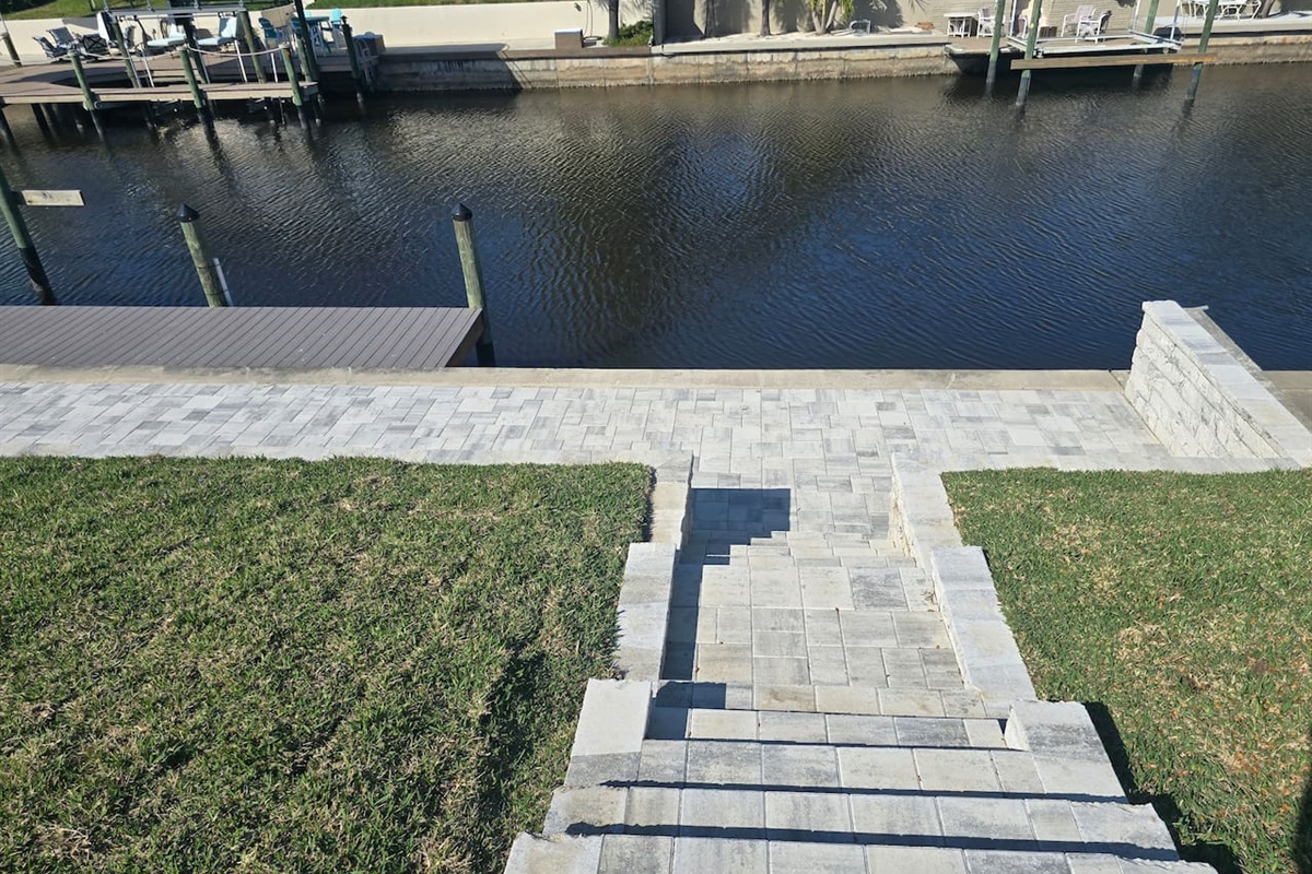 Brand -new paved stairs leading from the pool area to the boat dock