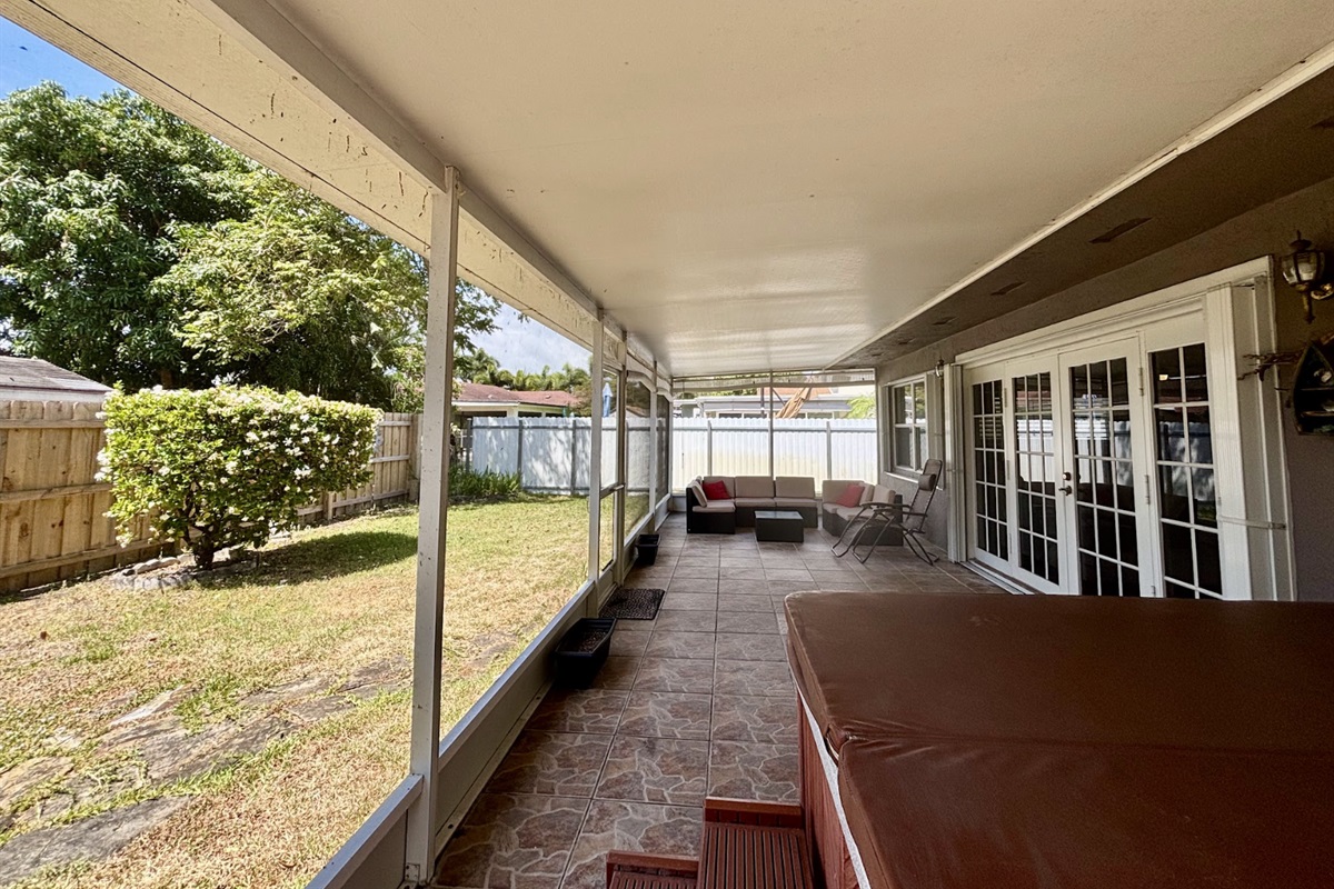 The sunroom is a great way to stay out of the heat while still enjoying all the green space.