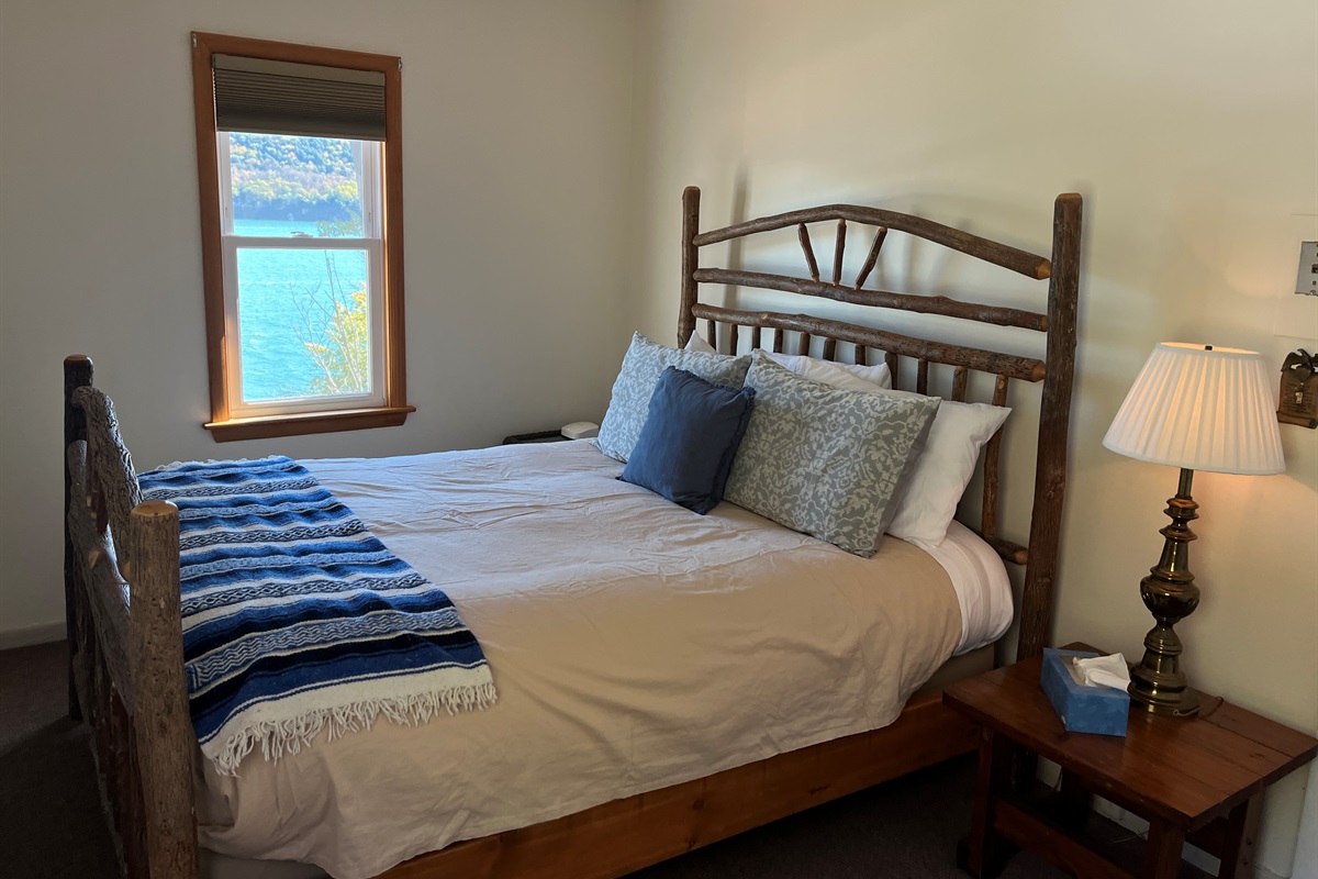 Queen bedroom with lake view