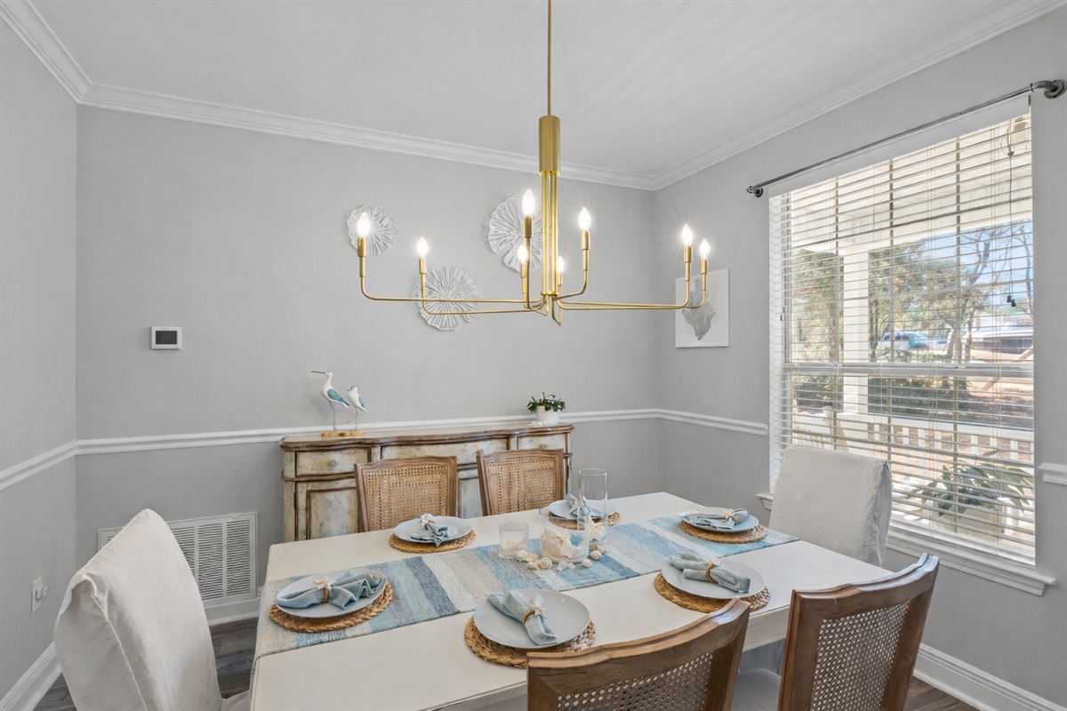 Coastal dinners, card games, or morning mimosas — the heart of the cottage is ready for memories.