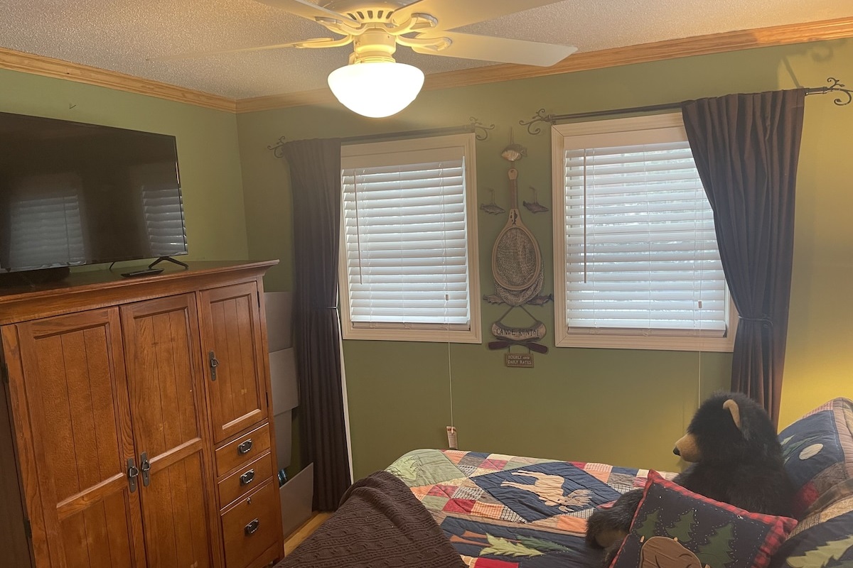 Main Floor Bedroom - Queen Bed with TV