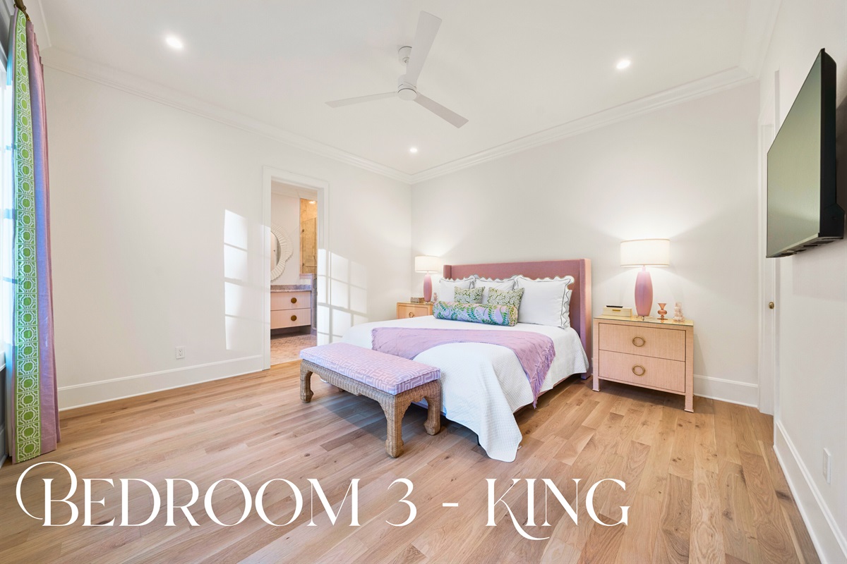 Guest suite with cozy layout and lake-facing windows.