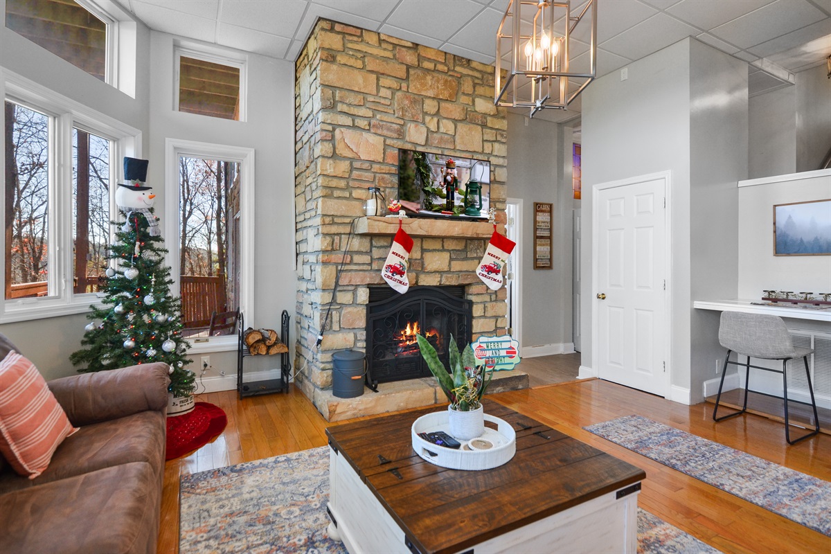Coffee table foosball and additional TV in the lower level living room.
