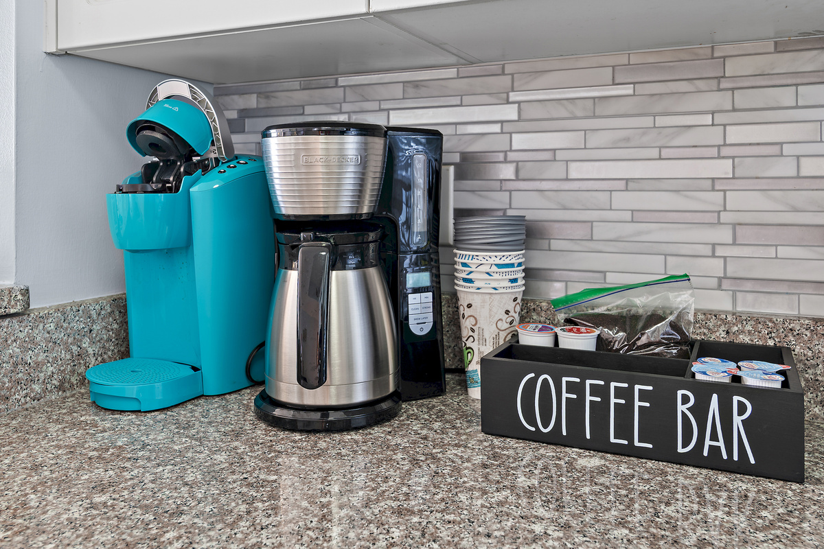 Kitchen has GULF VIEWS, granite countertops, stainless appliances - fully stocked with more than the basics (coffee/tea bar, oils/salt and pepper, plenty of pots/pans/cookware)