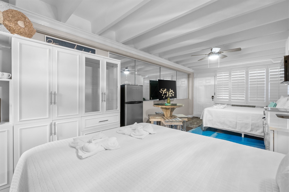 Living Room with Queen Bed and Queen Sleeper Sofa