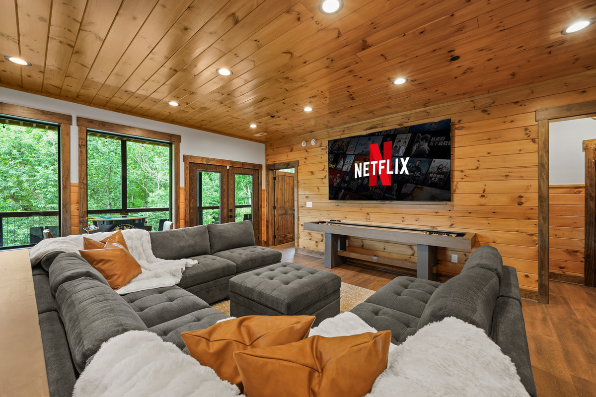 The perfect hangout after a day exploring the Smokies. Watch movies or the big game on the massive 100-inch TV, relax on the plush sectional, or grab a drink at the bar-top seating. Enjoy hours of fun with pool, shuffleboard, foosball, and classic arcade t