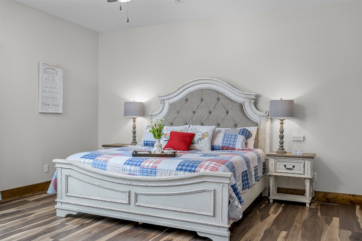 Main level: Anne Shirley room with King bed, recliner, and ensuite bath