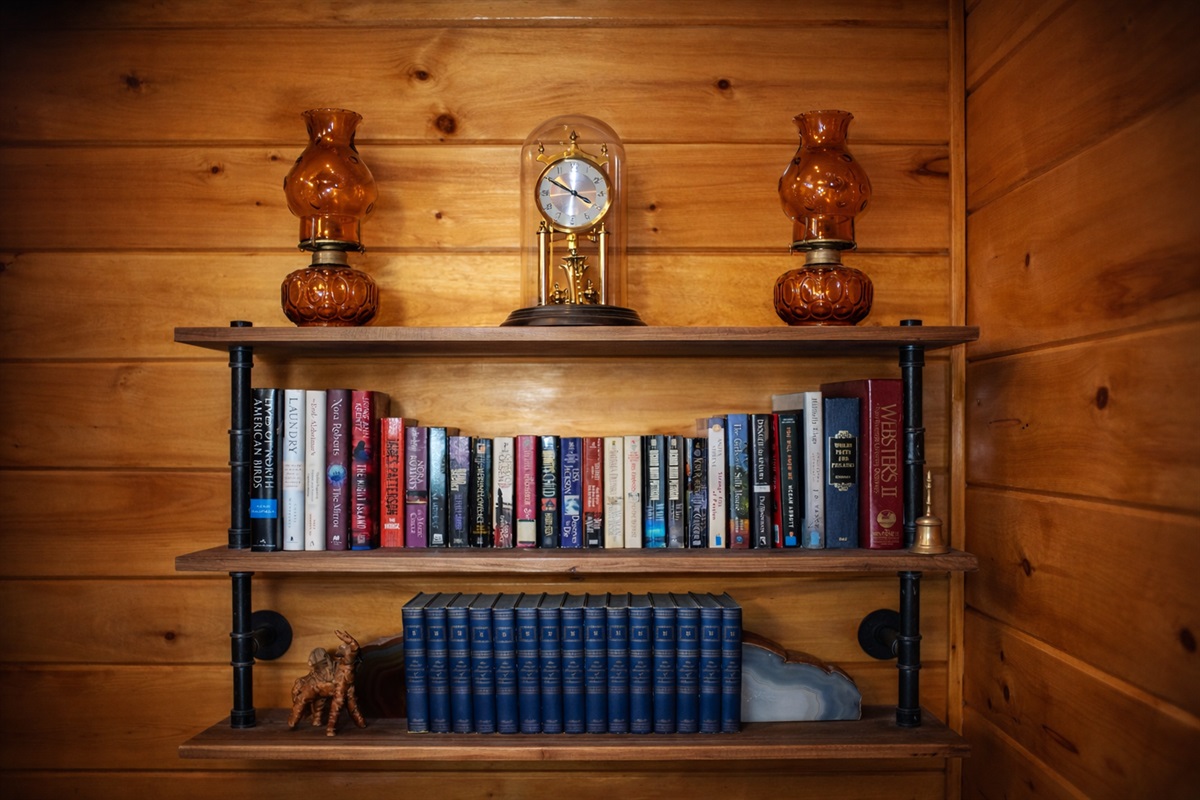 Collection of books in bedroom 1.