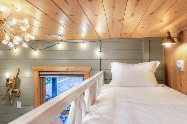 A comfy, roomy twin xl bed with a magical view below.