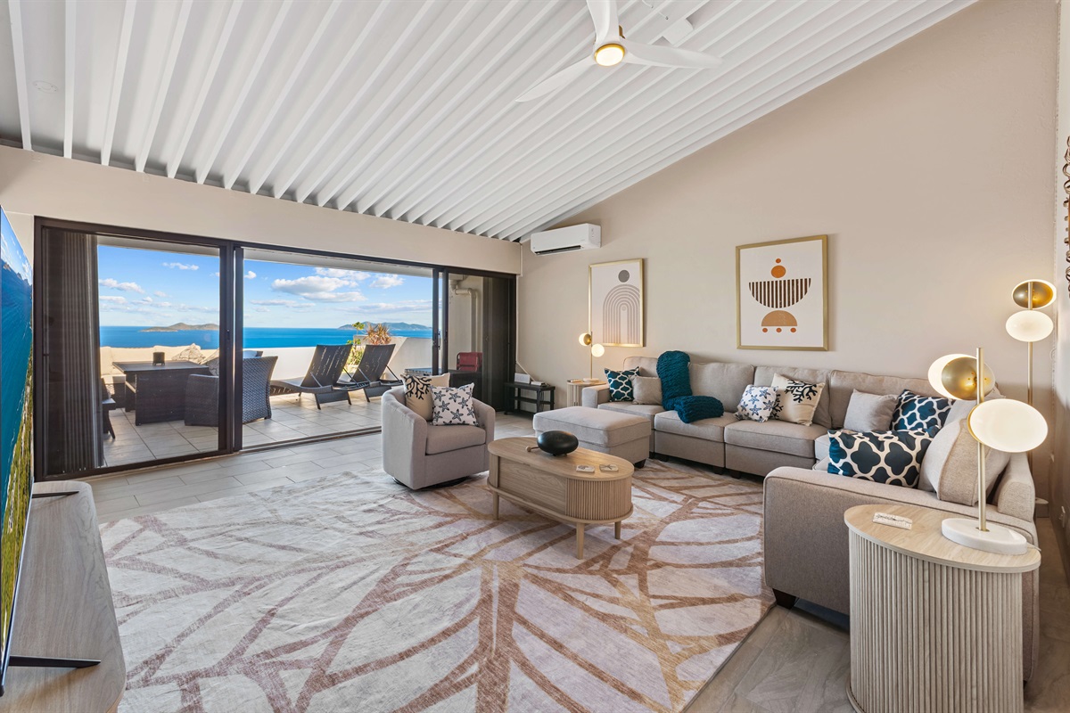 Spacious living room leads onto the patio