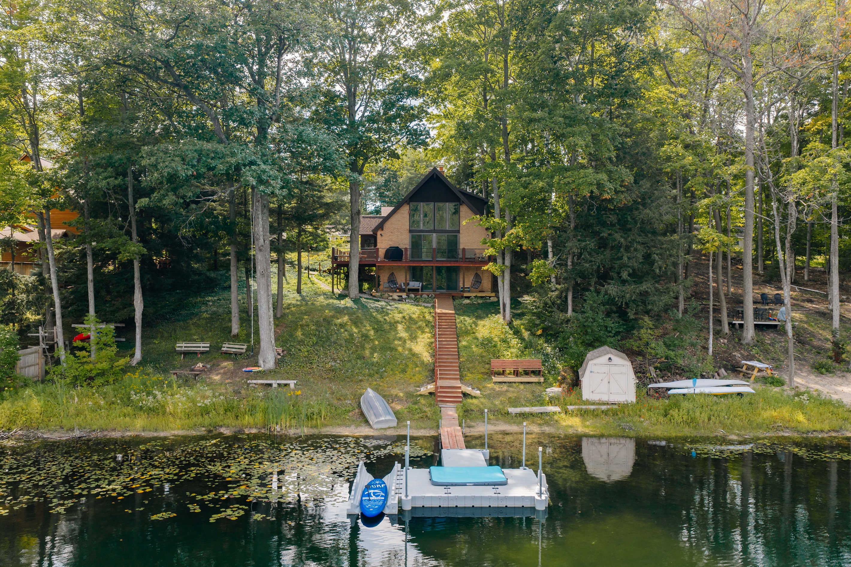 Backyard view with private shoreline and lakeside seating