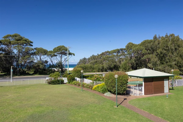 Enjoy the view across the lawn to the beach.