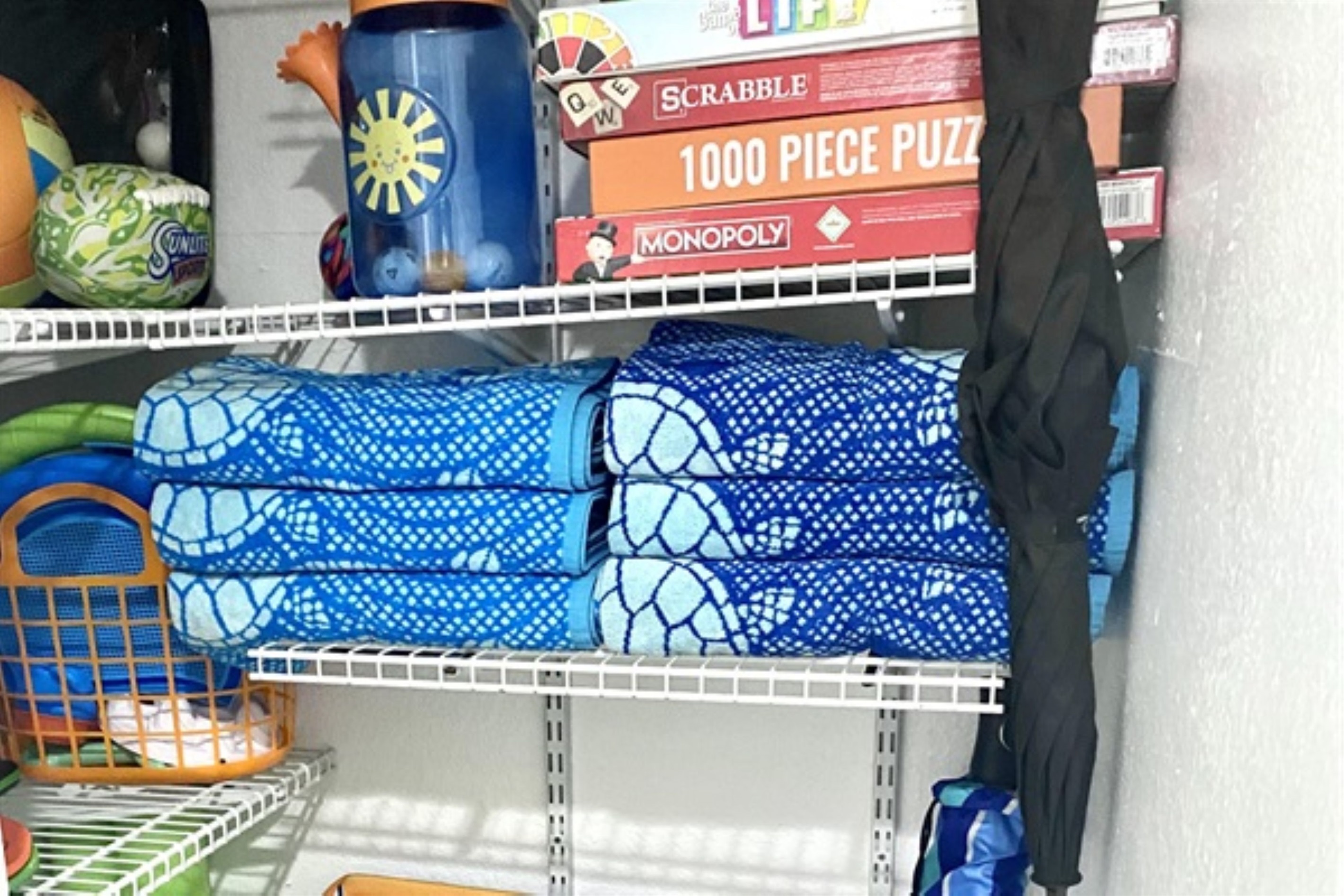 Beach chairs, boogie boards, sun umbrella, beach toys, and board games