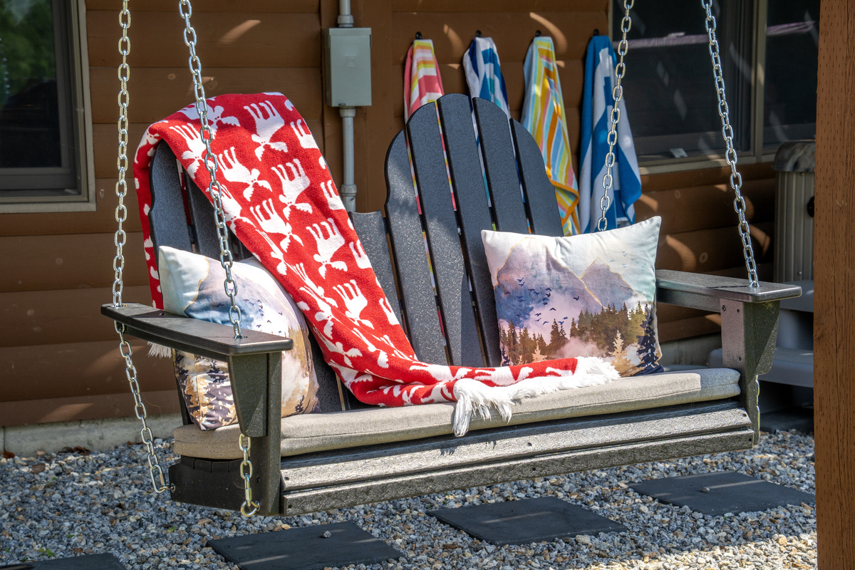 The Adirondack porch swing adds a warm, inviting touch to your stay! Perfect for relaxing, reconnecting, and enjoying the little moments.