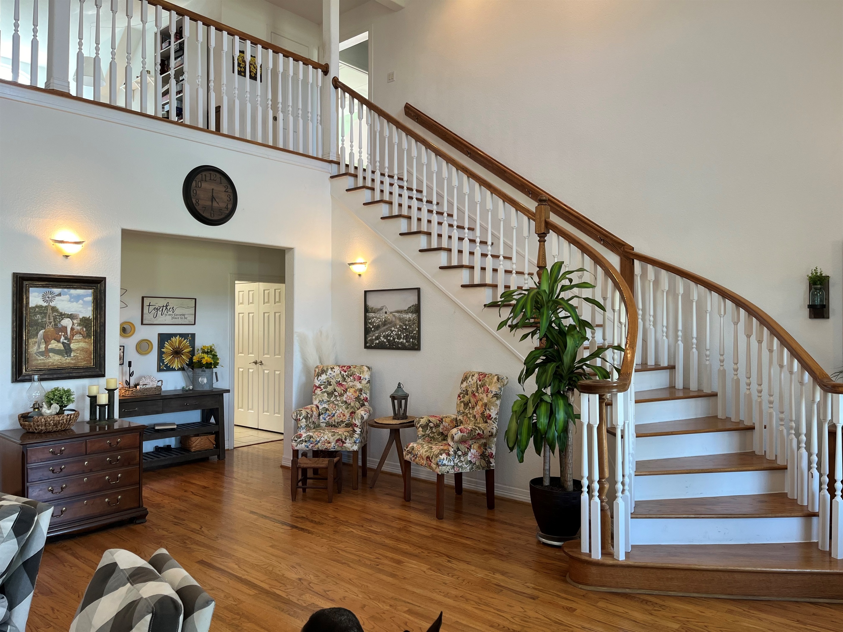 Beautiful curved wooden staircase.