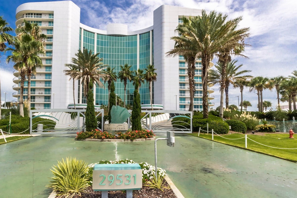 An inviting entrance to a stunning coastal residence, where modern design harmonizes with the natural beauty of the Ole River.