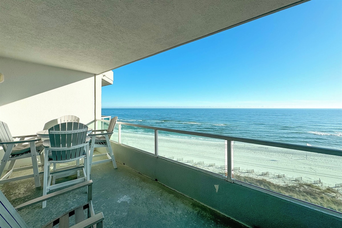 Balcony with dining set and additional seating 