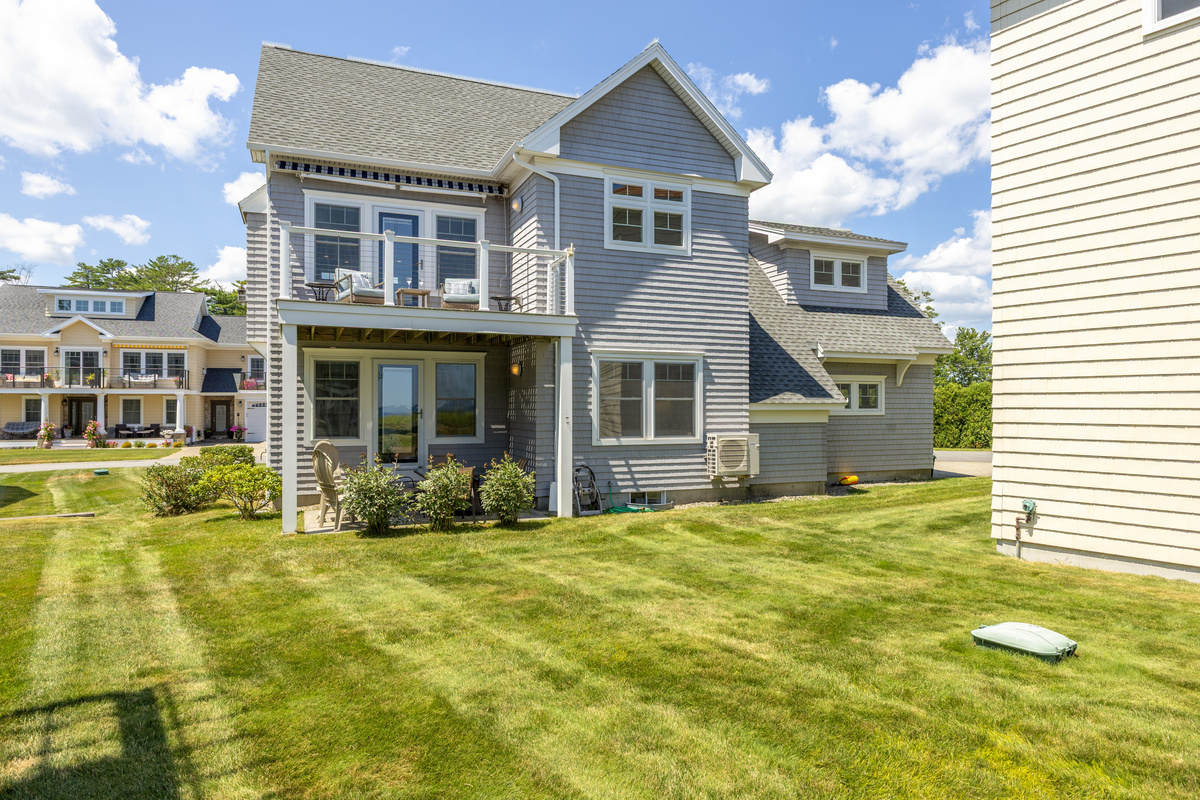 Step outside and enjoy the relaxed coastal setting from the home's backyard and patio area.