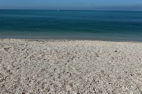Some days the calm blue water blends right into the clear blue sky