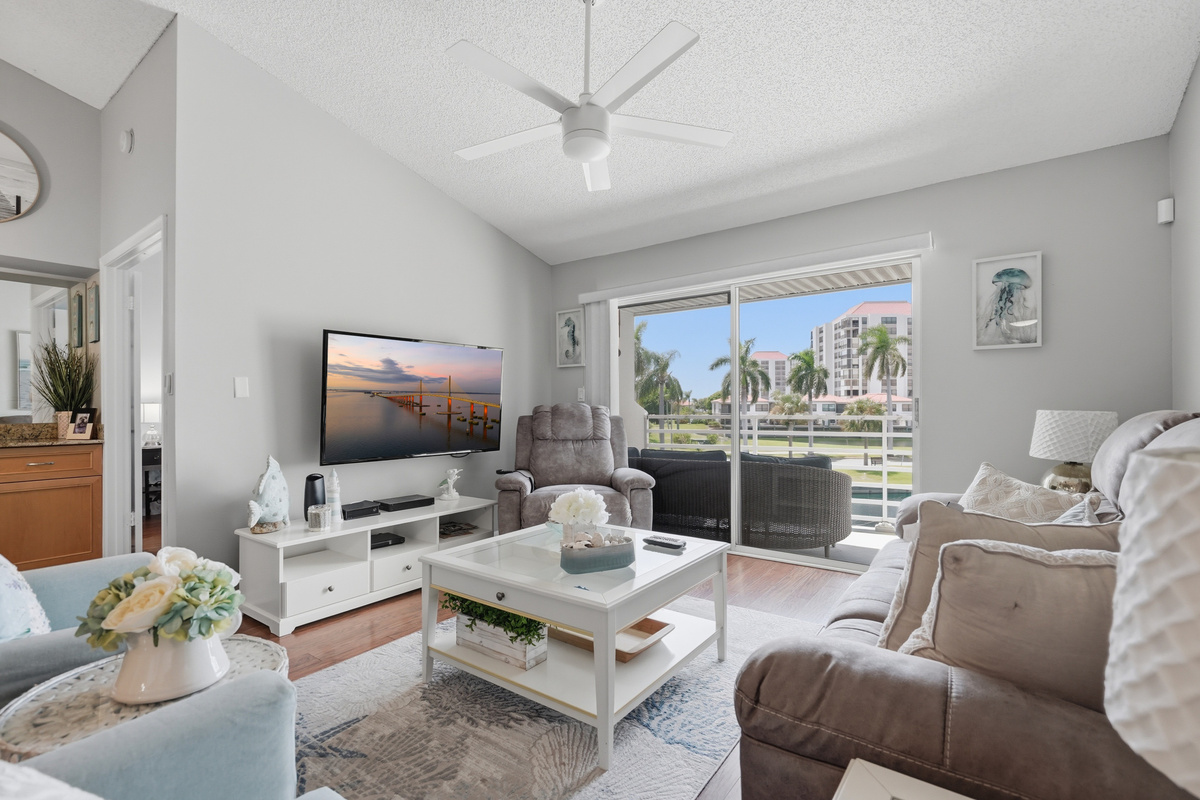 Spacious and comfortable, the living room offers a welcoming place to relax, watch cable TV, enjoy the views, or spend quality time together after a day exploring St. Pete Beach and the surrounding area.