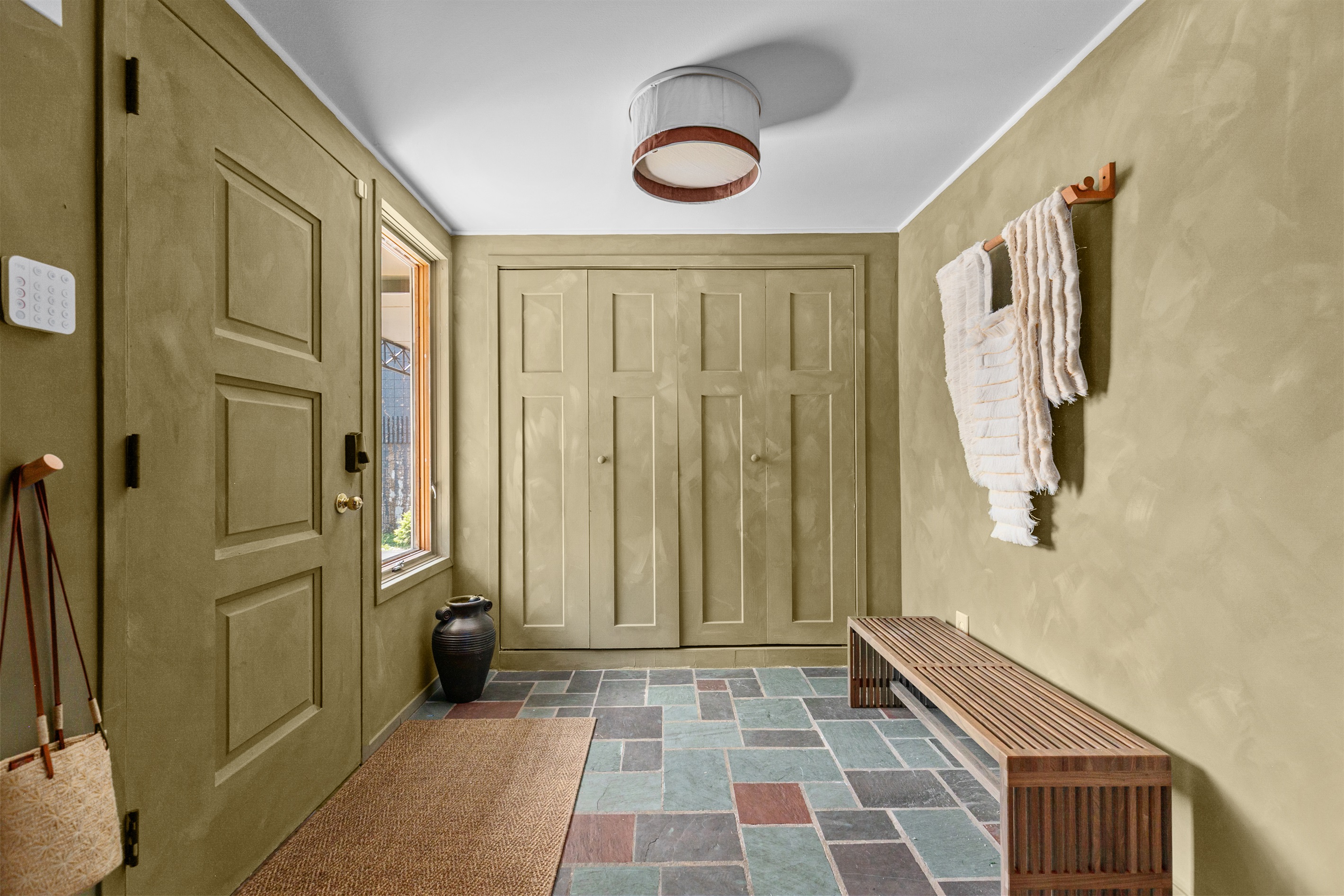 The front closet provides a convenient space to store your jackets and outerwear, keeping the entryway tidy and organized.