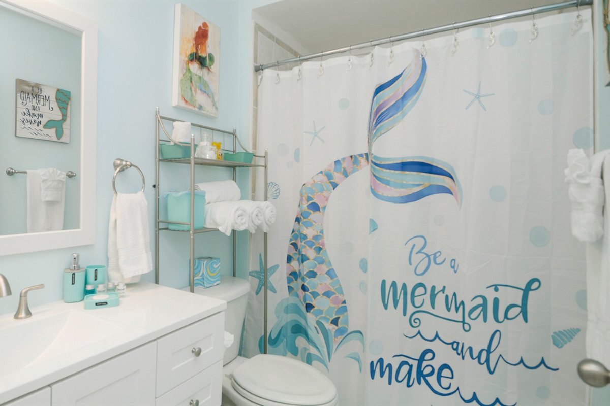 Guest bathroom with shower and tub
