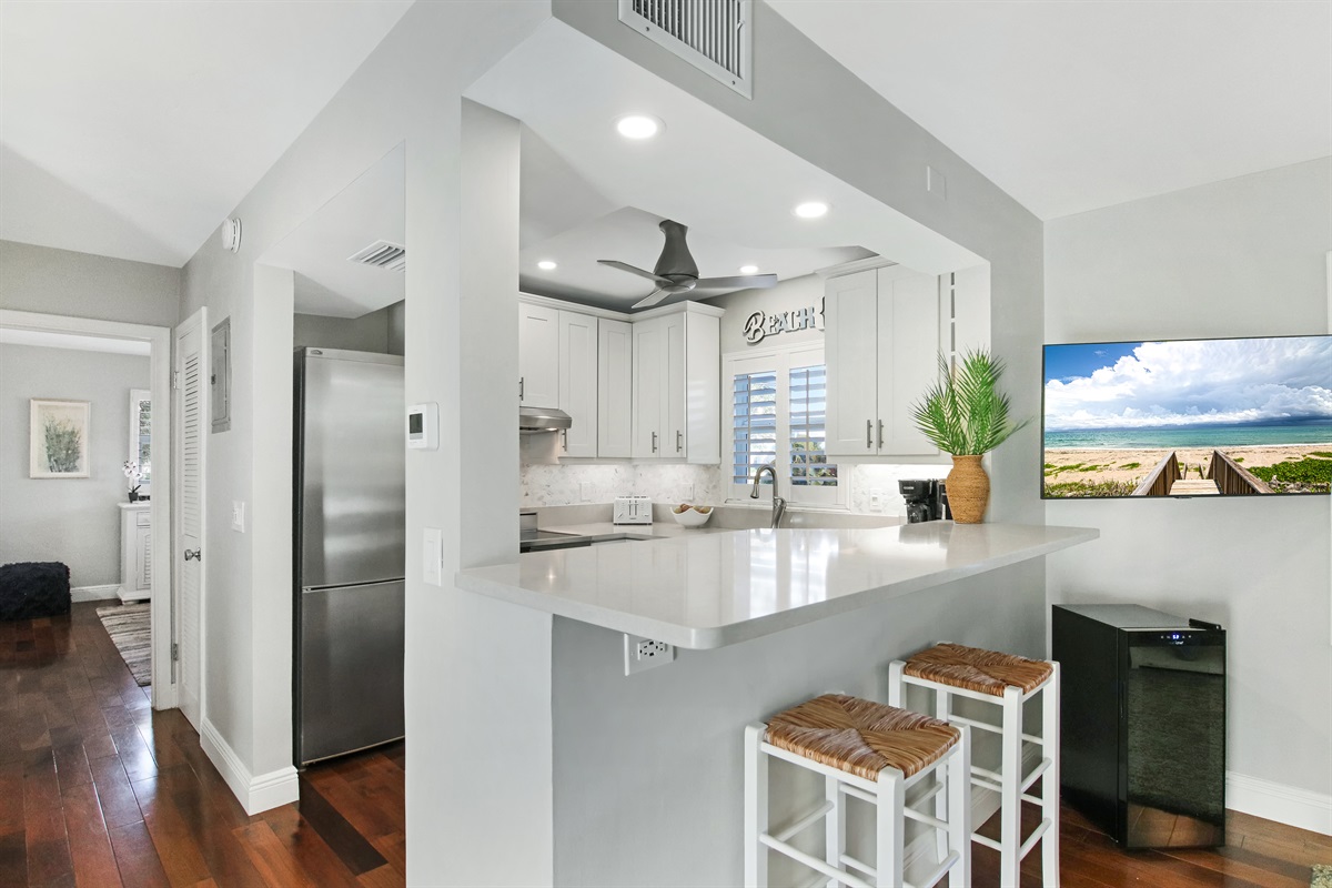 Island seating open to the kitchen