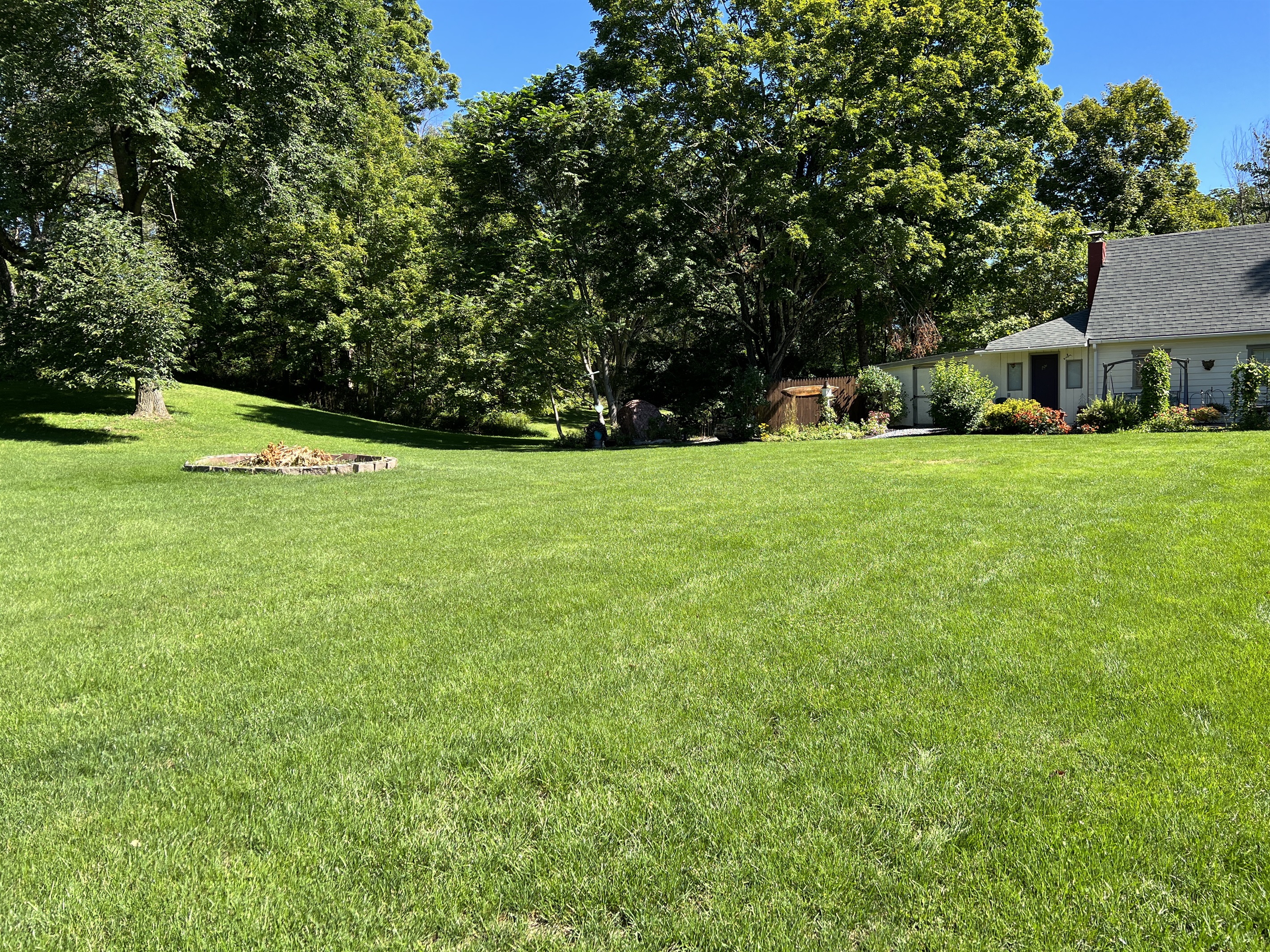 Large backyard with fire pit
