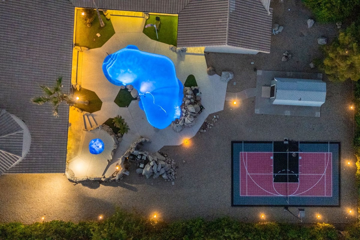 From above, see how the pool, spa, and basketball court come together for non-stop outdoor fun.
