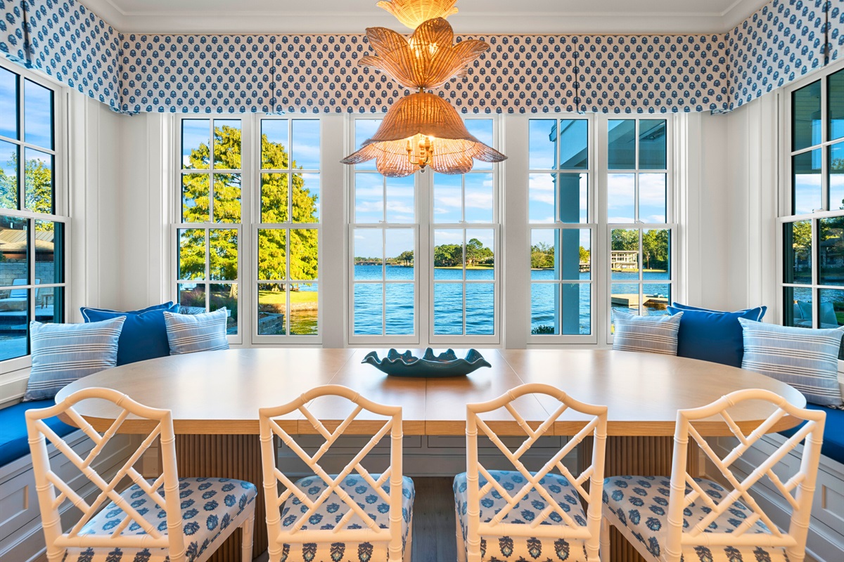 Bright breakfast bar and open dining area with natural light.