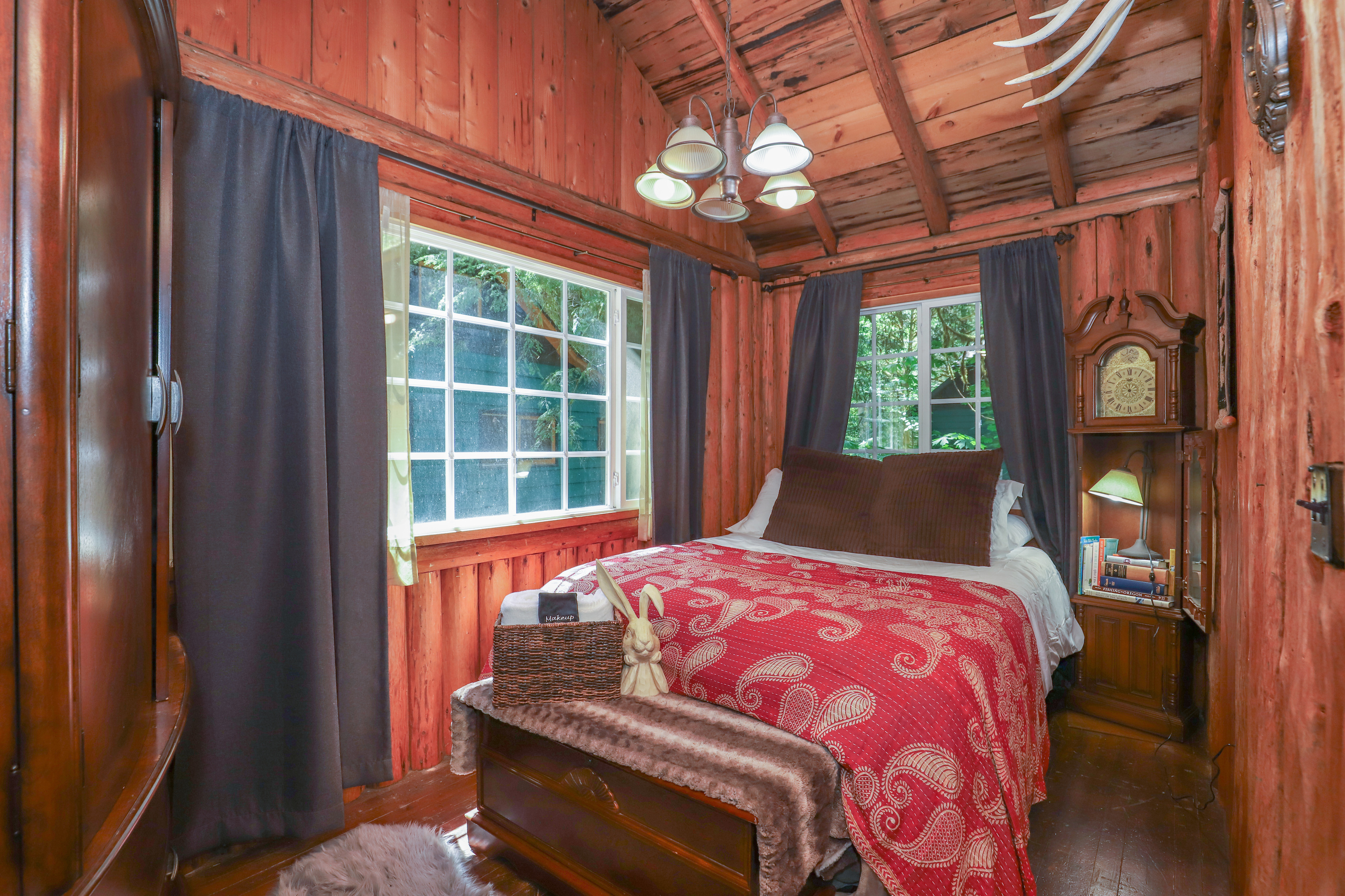 3rd Main Floor Bedroom with restored Steiner Cabin Finishes