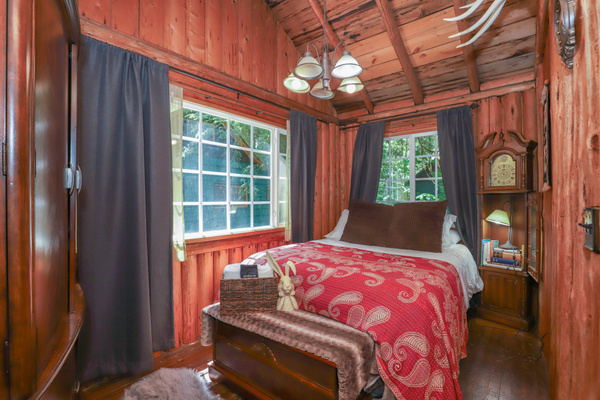 3rd Main Floor Bedroom with restored Steiner Cabin Finishes