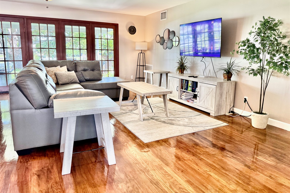 Gather the whole group in this spacious living room with a comfy sectional, Smart TV, and board games nearby—perfect for relaxing nights in.