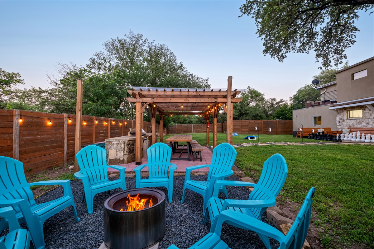 Gather around the fire pit for cozy nights under the stars while enjoying the spacious backyard, outdoor dining area, grill, lawn games, and plenty of room to relax with family and friends.
