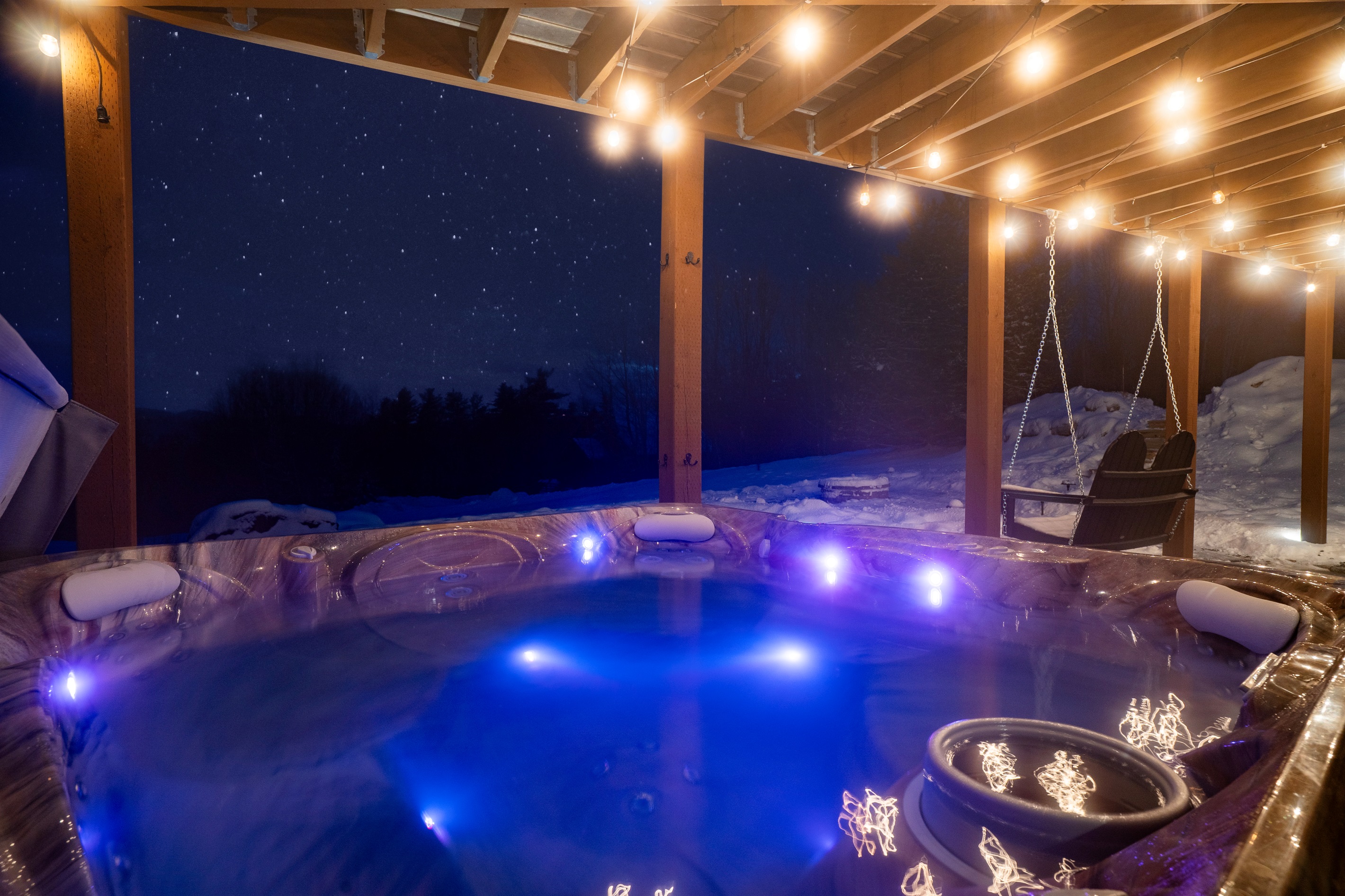 Experience ultimate relaxation with a night-time hot tub soak