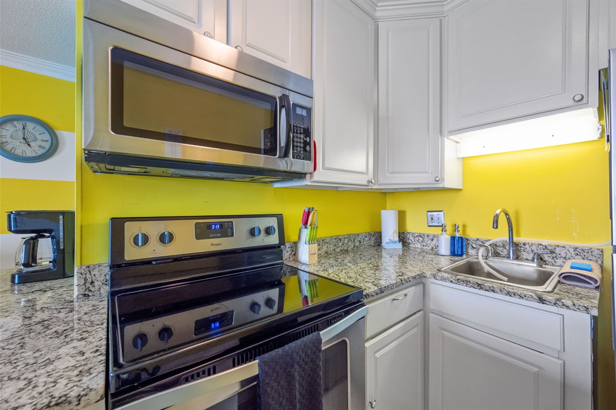 Granite countertops, stainless steel appliances, and everything you need to cook during your stay