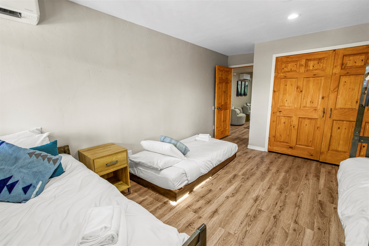 4 twin beds, ground floor bedroom 2